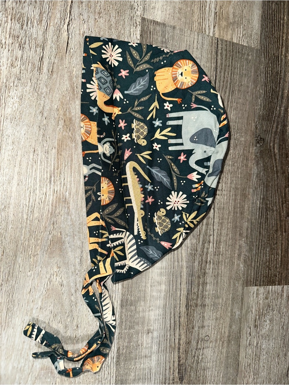 Animal tie-back surgical cap